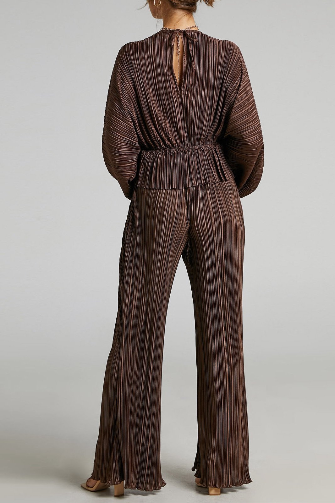 Well Tailored Garment with a Graceful Silhouette