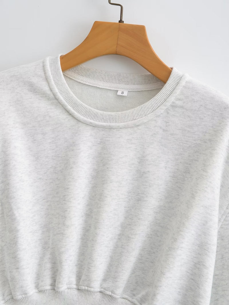 A Vintage Style Sweater with Delicate Timeless Details