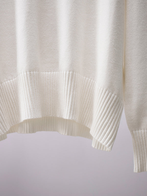 A Vintage Style Sweater with Delicate Timeless Details