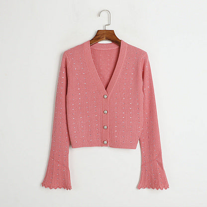A Vintage Style Sweater with Delicate Timeless Details