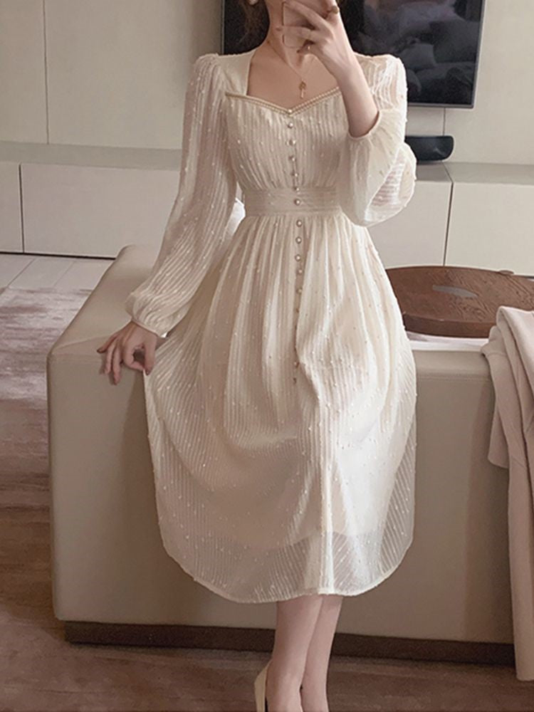 A Vintage Style Dress with Delicate Timeless Details