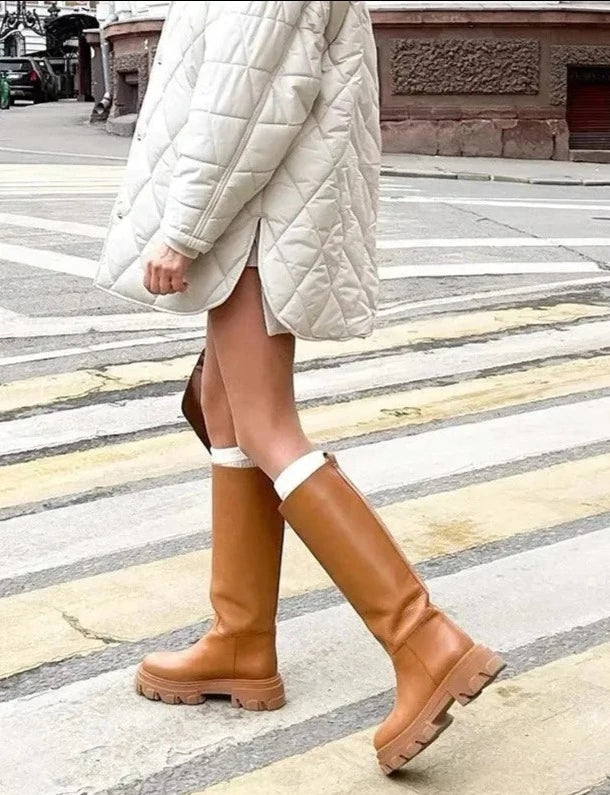 Well Tailored Boots with a Graceful Silhouette
