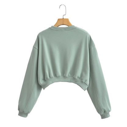 A Vintage Style Sweater with Delicate Timeless Details