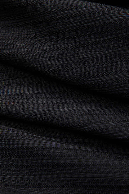 Well Tailored Garment with a Graceful Silhouette