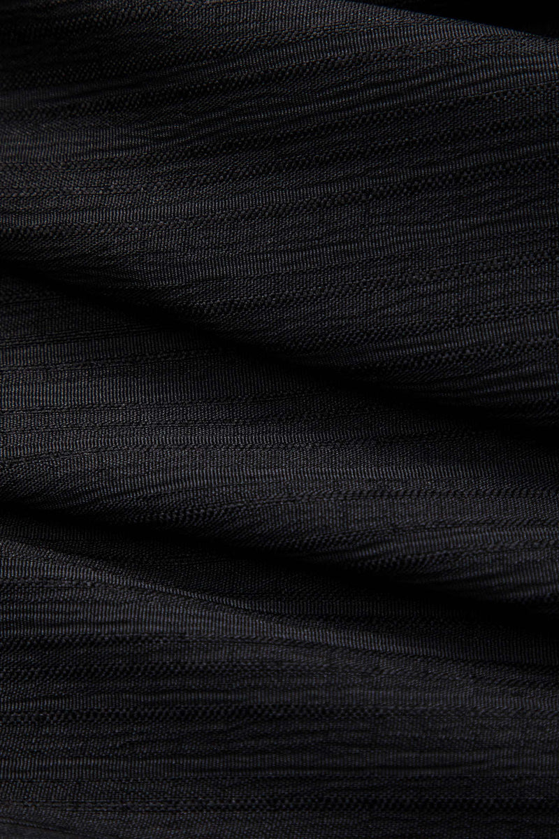 Well Tailored Garment with a Graceful Silhouette