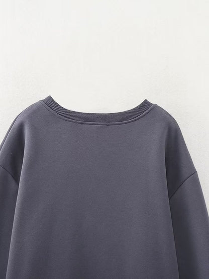 A Vintage Style Sweater with Delicate Timeless Details