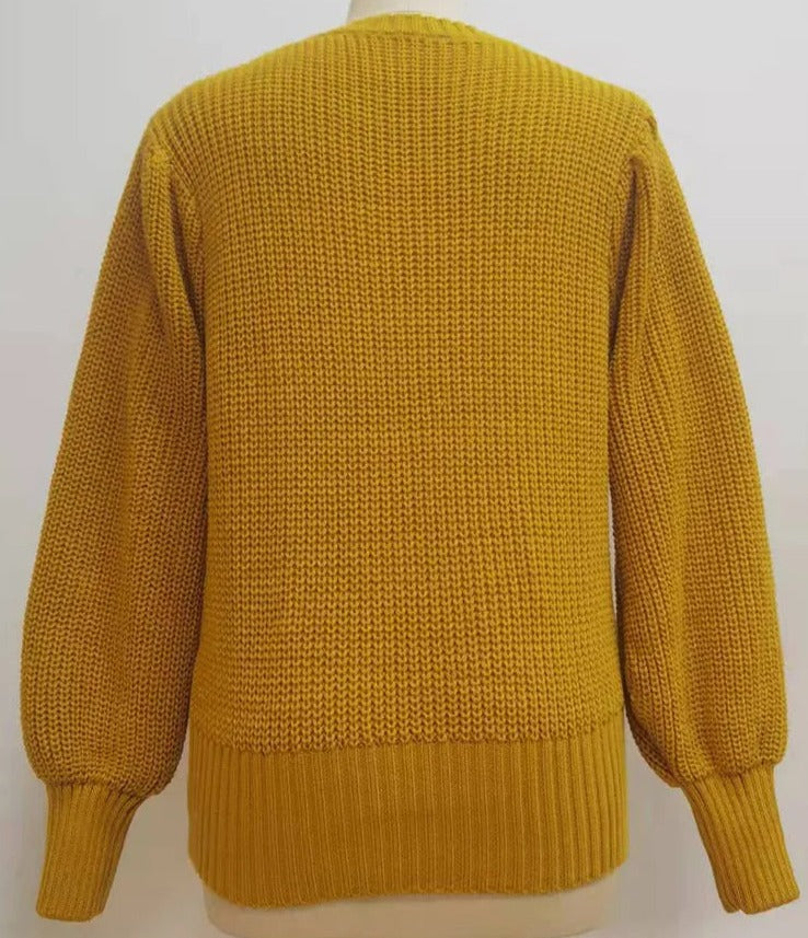 A Vintage Style Sweater with Delicate Timeless Details