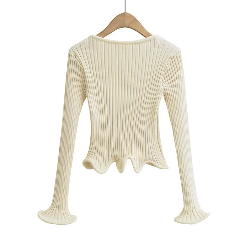 A Vintage Style Cardigan with Delicate Timeless Details