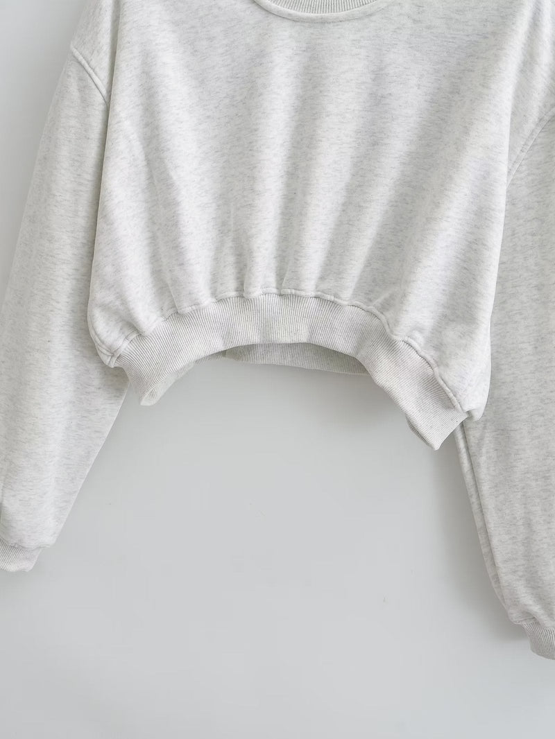 A Vintage Style Sweater with Delicate Timeless Details