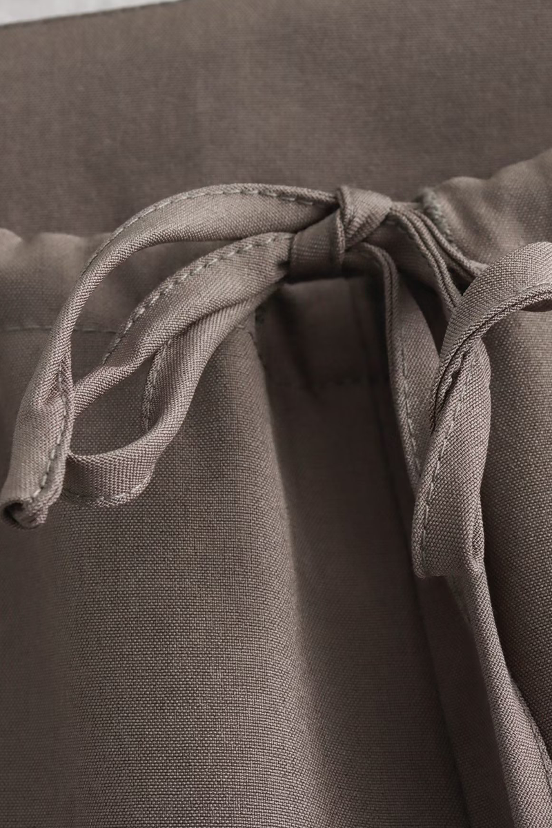 Well Tailored Garment with a Graceful Silhouette