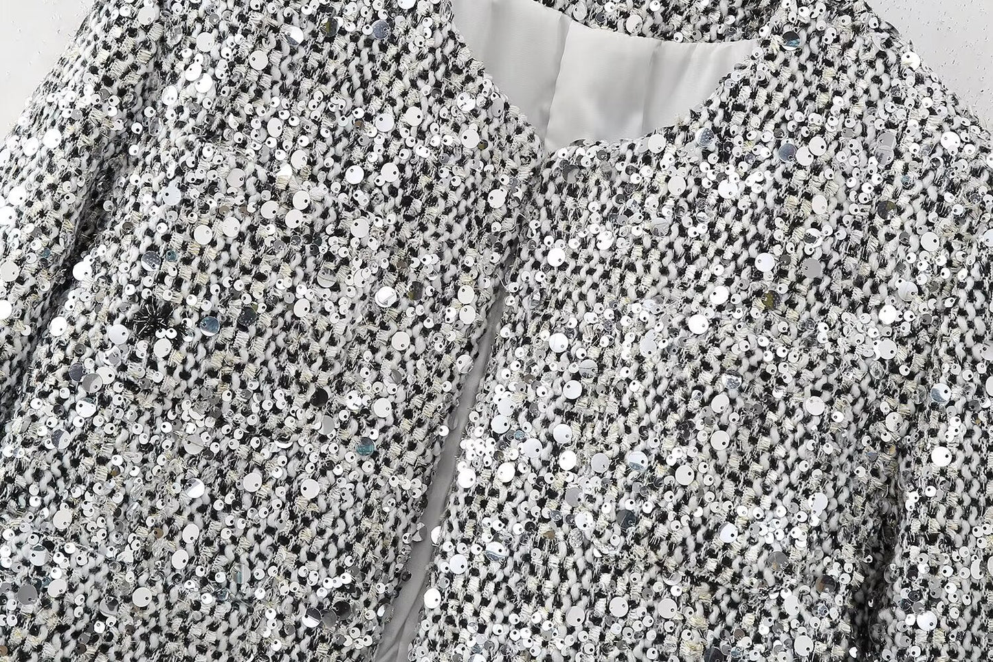 Well Tailored Garment with a Graceful Silhouette
