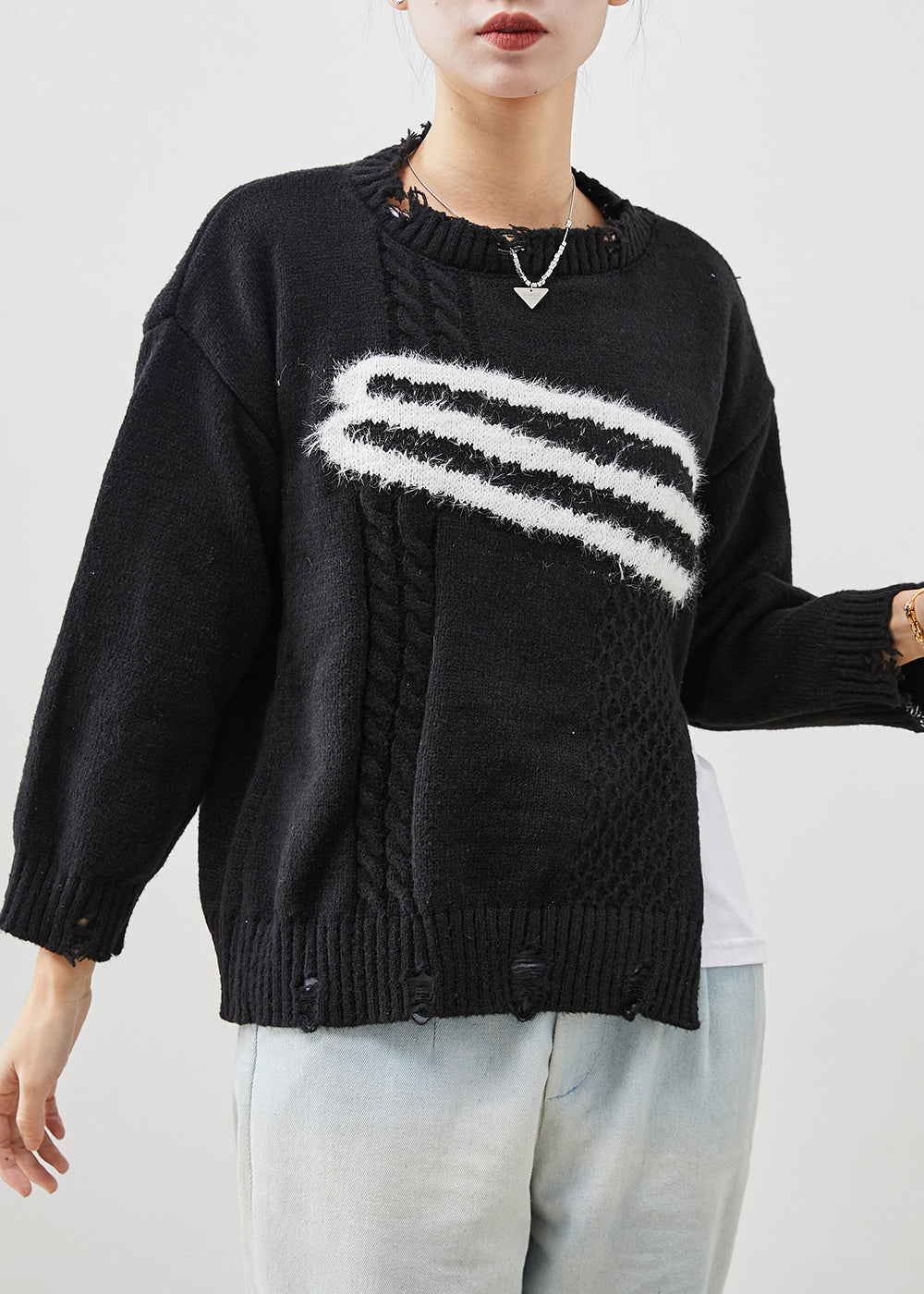 A Vintage Style Sweater with Delicate Timeless Details