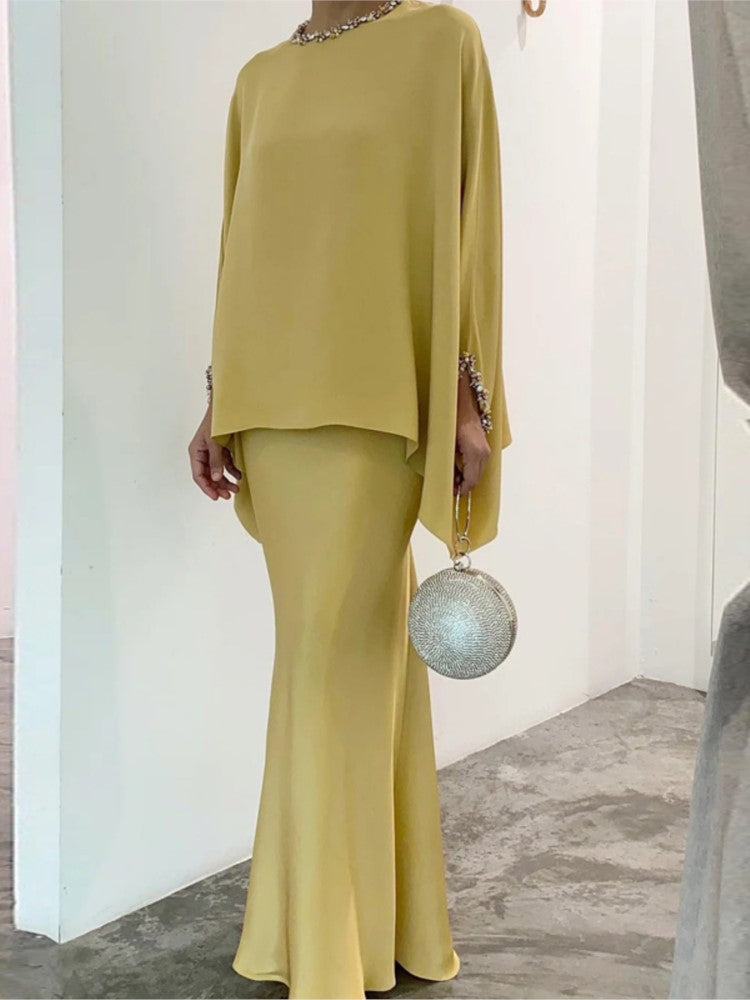 Well Tailored Garment with a Graceful Silhouette