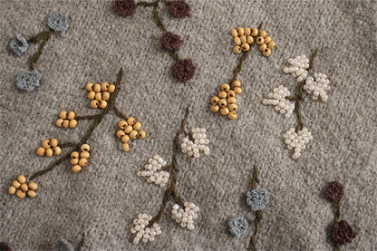 A Vintage Style Sweater with Delicate Timeless Details