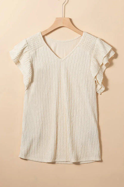 Well Tailored Top with a Graceful Silhouette