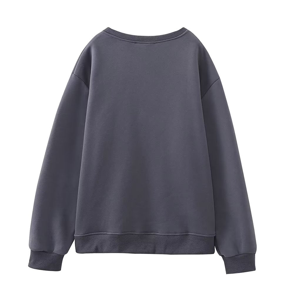 A Vintage Style Sweater with Delicate Timeless Details