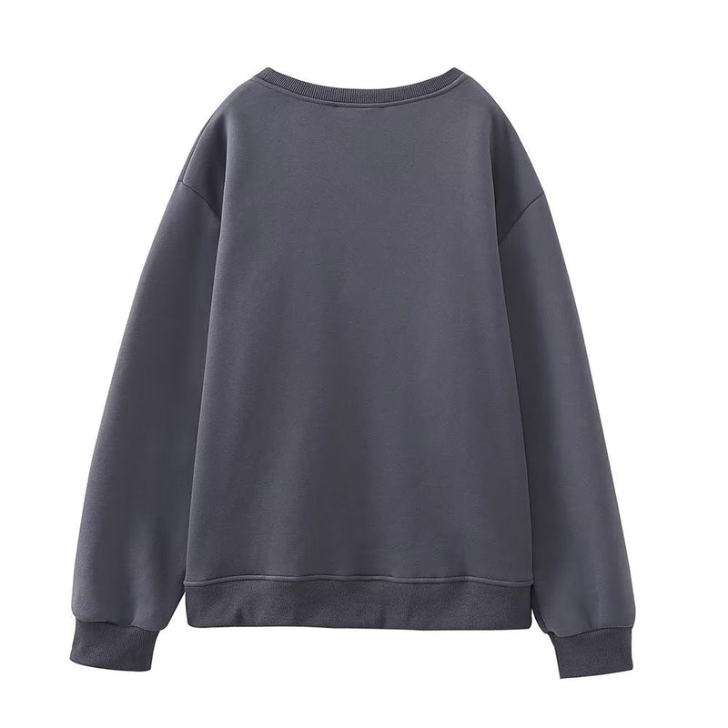 A Vintage Style Sweater with Delicate Timeless Details