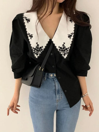 A Vintage Style Blouse with Delicate Timeless Details