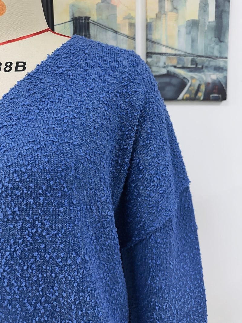 A Vintage Style Cardigan with Delicate Timeless Details