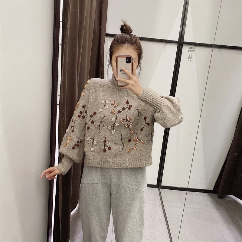 A Vintage Style Sweater with Delicate Timeless Details