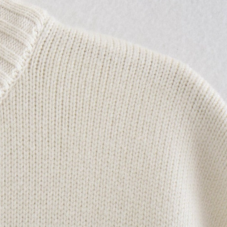 A Vintage Style Sweater with Delicate Timeless Details