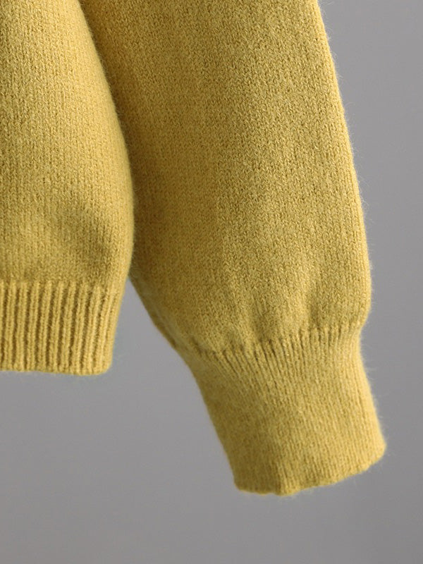 A Vintage Style Sweater with Delicate Timeless Details