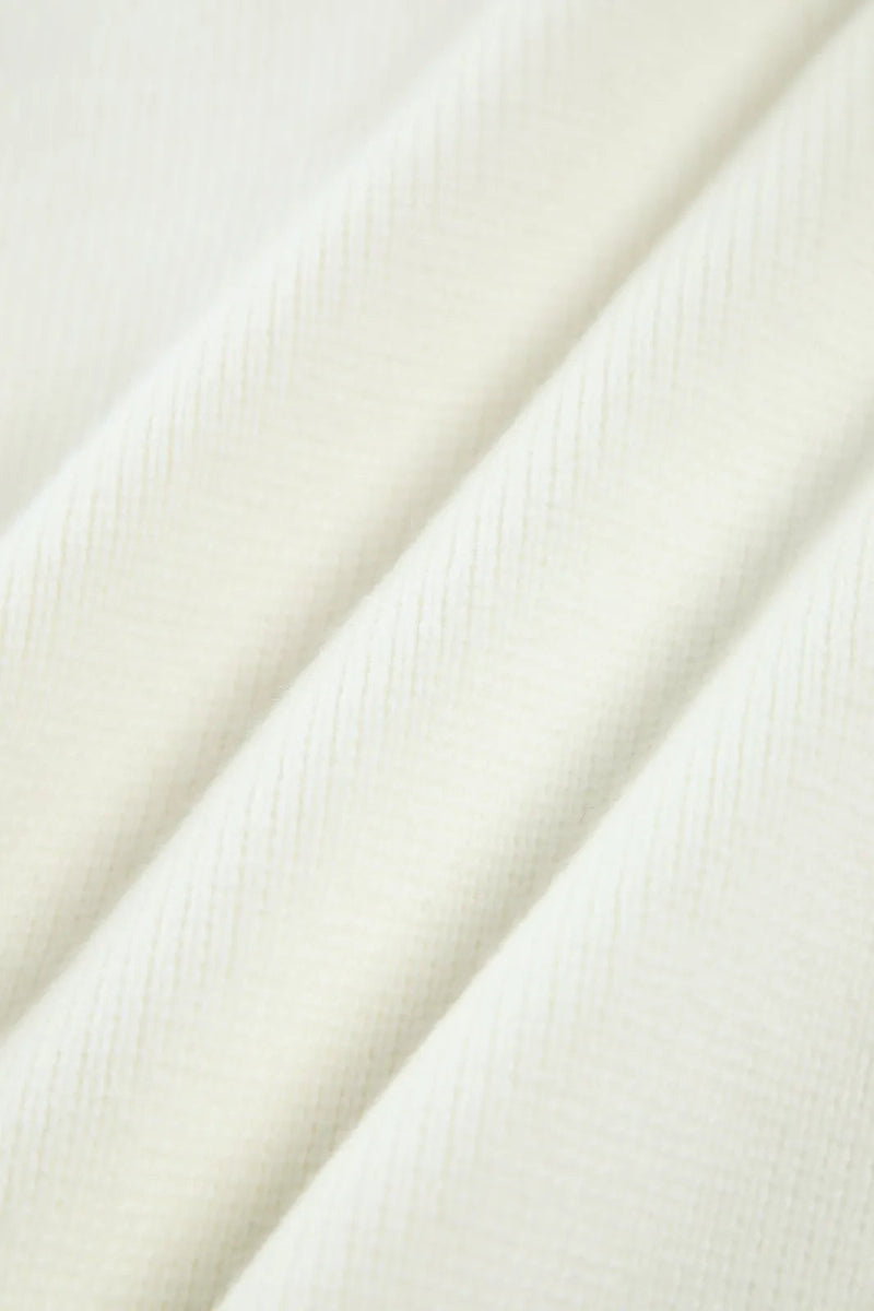 A Vintage Style Cardigan with Delicate Timeless Details