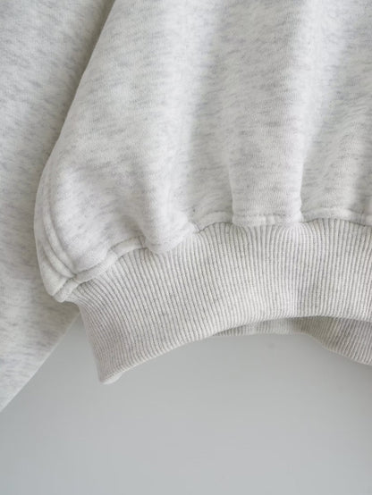A Vintage Style Sweater with Delicate Timeless Details