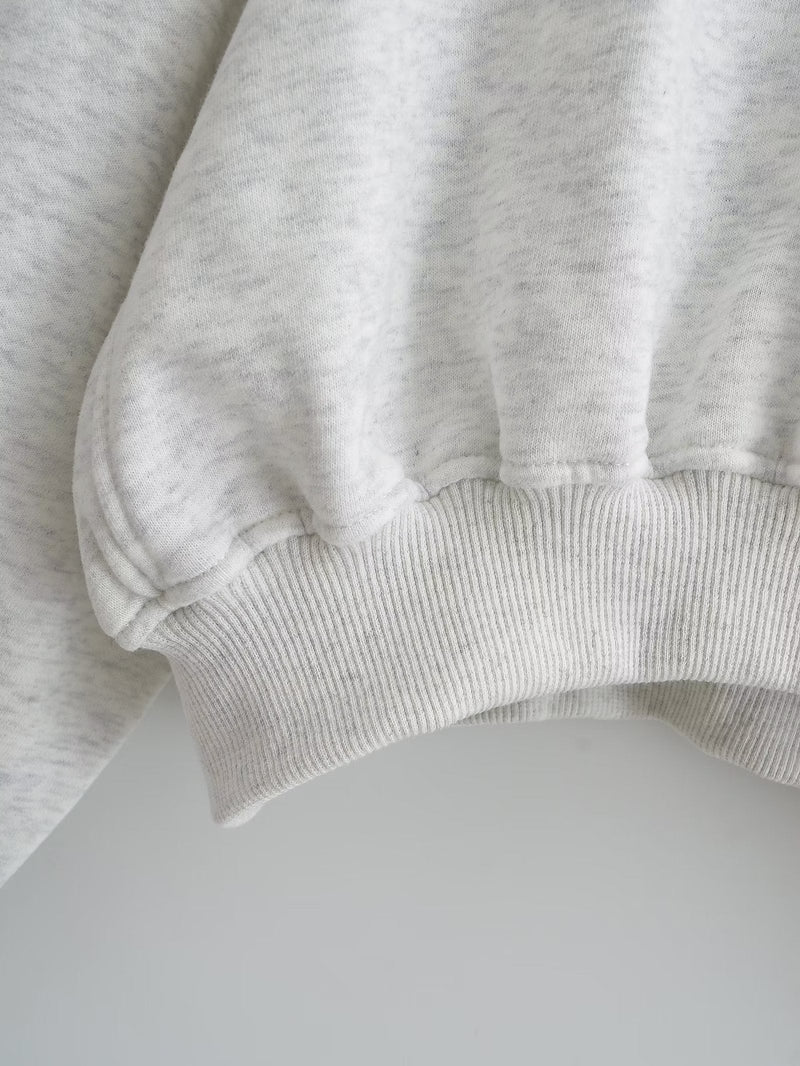 A Vintage Style Sweater with Delicate Timeless Details