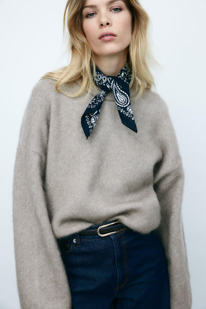 A Vintage Style Sweater with Delicate Timeless Details