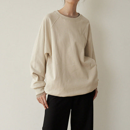 A Vintage Style Sweater with Delicate Timeless Details