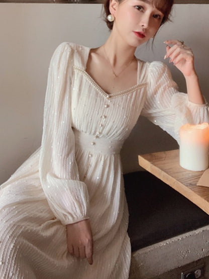 A Vintage Style Dress with Delicate Timeless Details