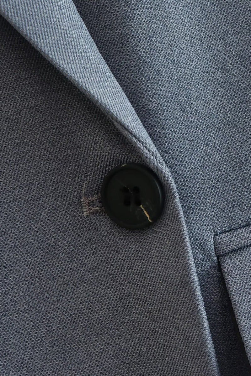 Well Tailored Garment with a Graceful Silhouette