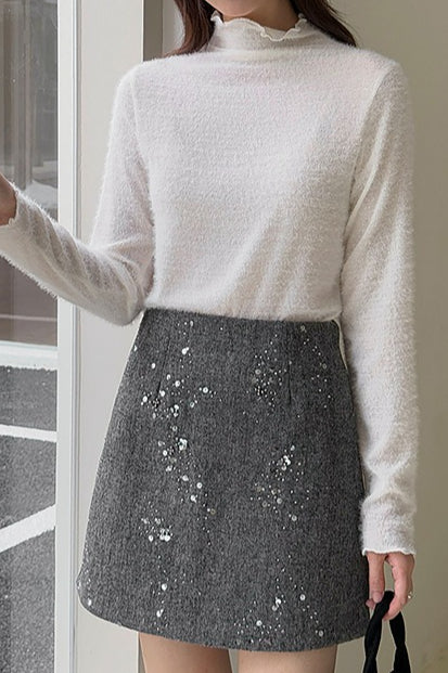 Well Tailored Garment with a Graceful Silhouette