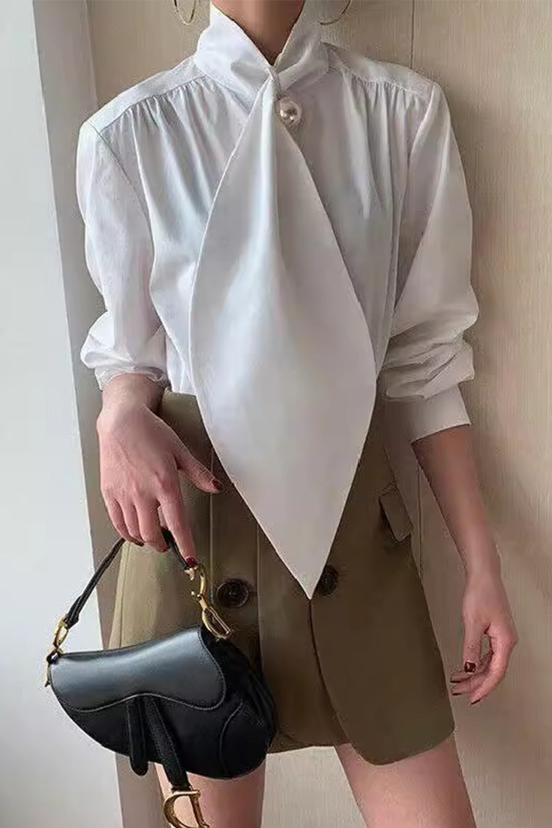A Vintage Style Blouse with Delicate Timeless Details