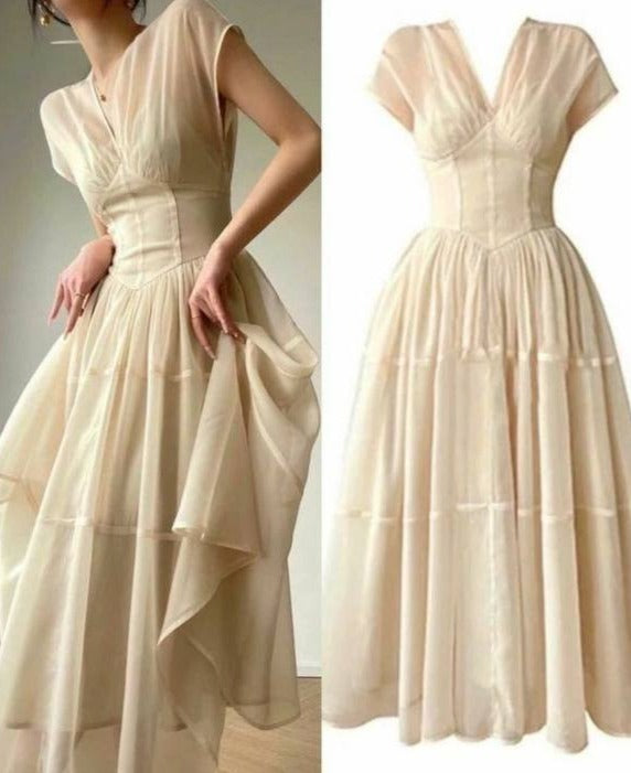 Beautifully Finished Dress in a Timeless Design