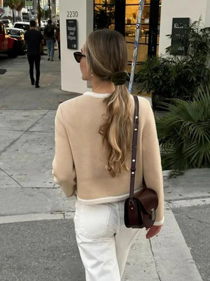 A Vintage Style Cardigan with Delicate Timeless Details