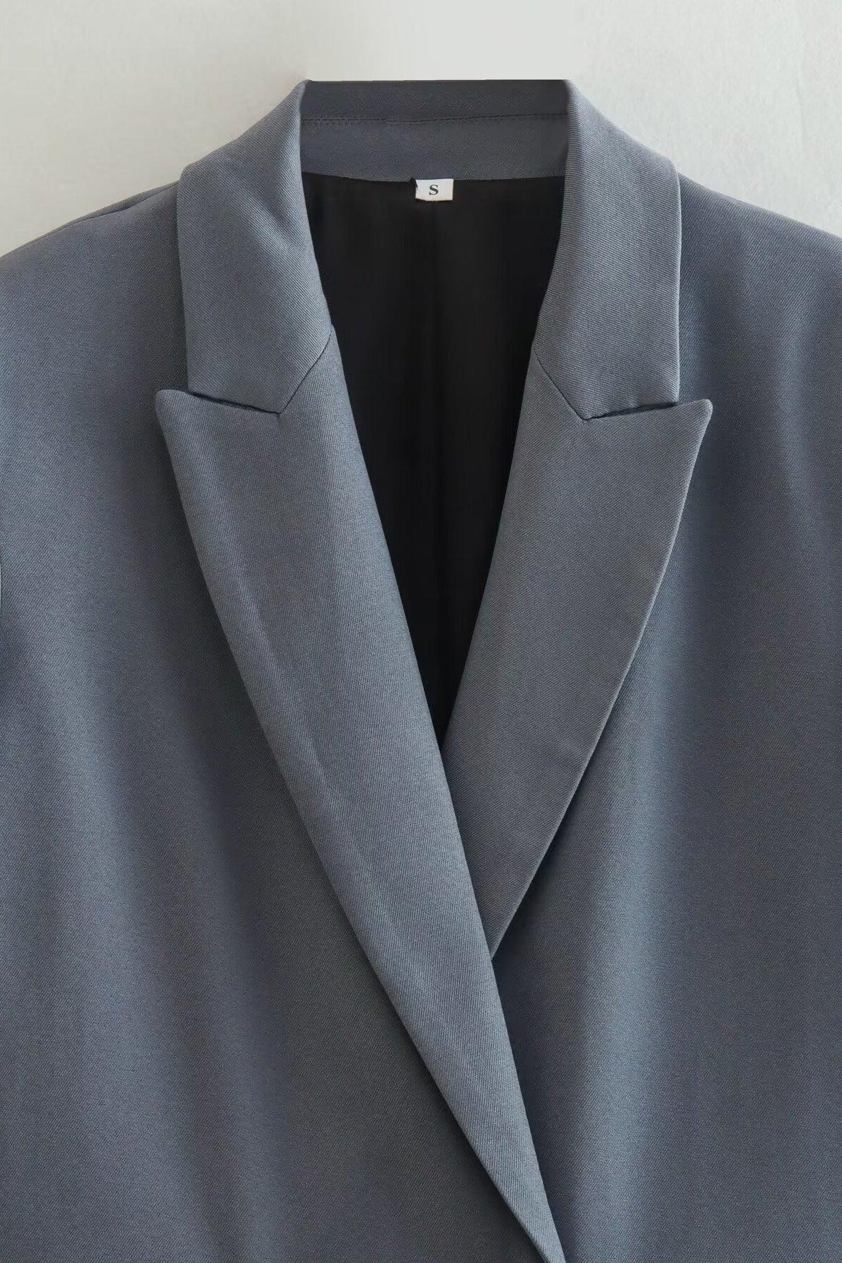 Well Tailored Garment with a Graceful Silhouette