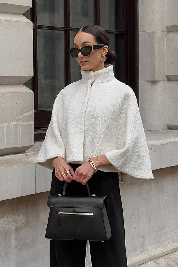 A Vintage Style Coat with Delicate Timeless Details