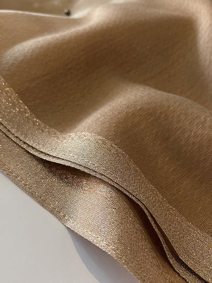 Well Tailored Garment with a Graceful Silhouette