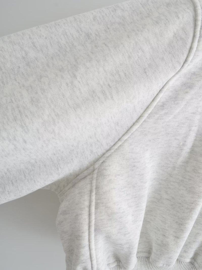 A Vintage Style Sweater with Delicate Timeless Details