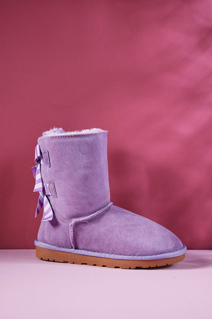 Well Tailored Boots with a Graceful Silhouette