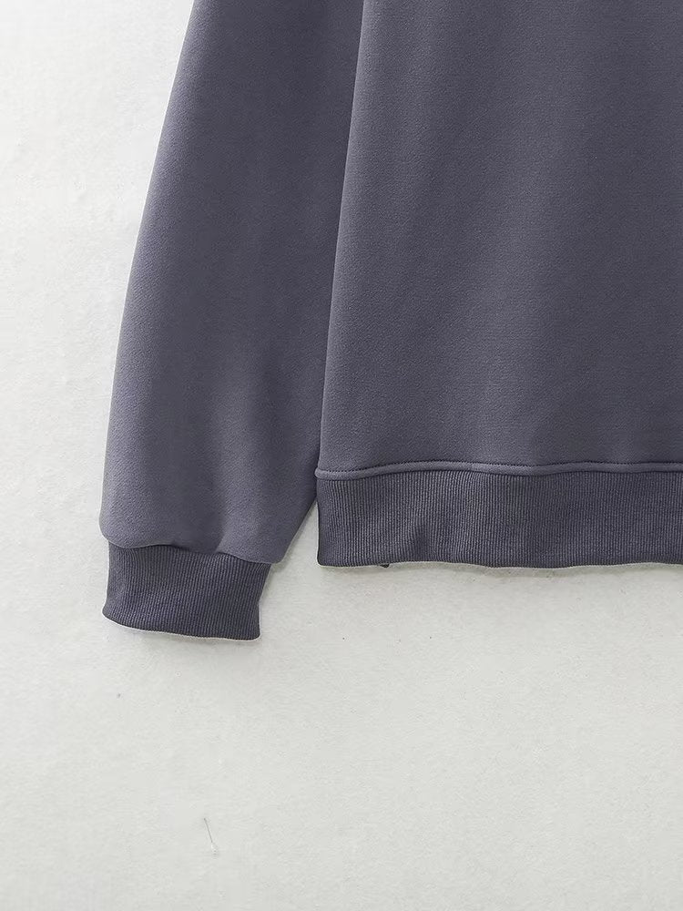 A Vintage Style Sweater with Delicate Timeless Details