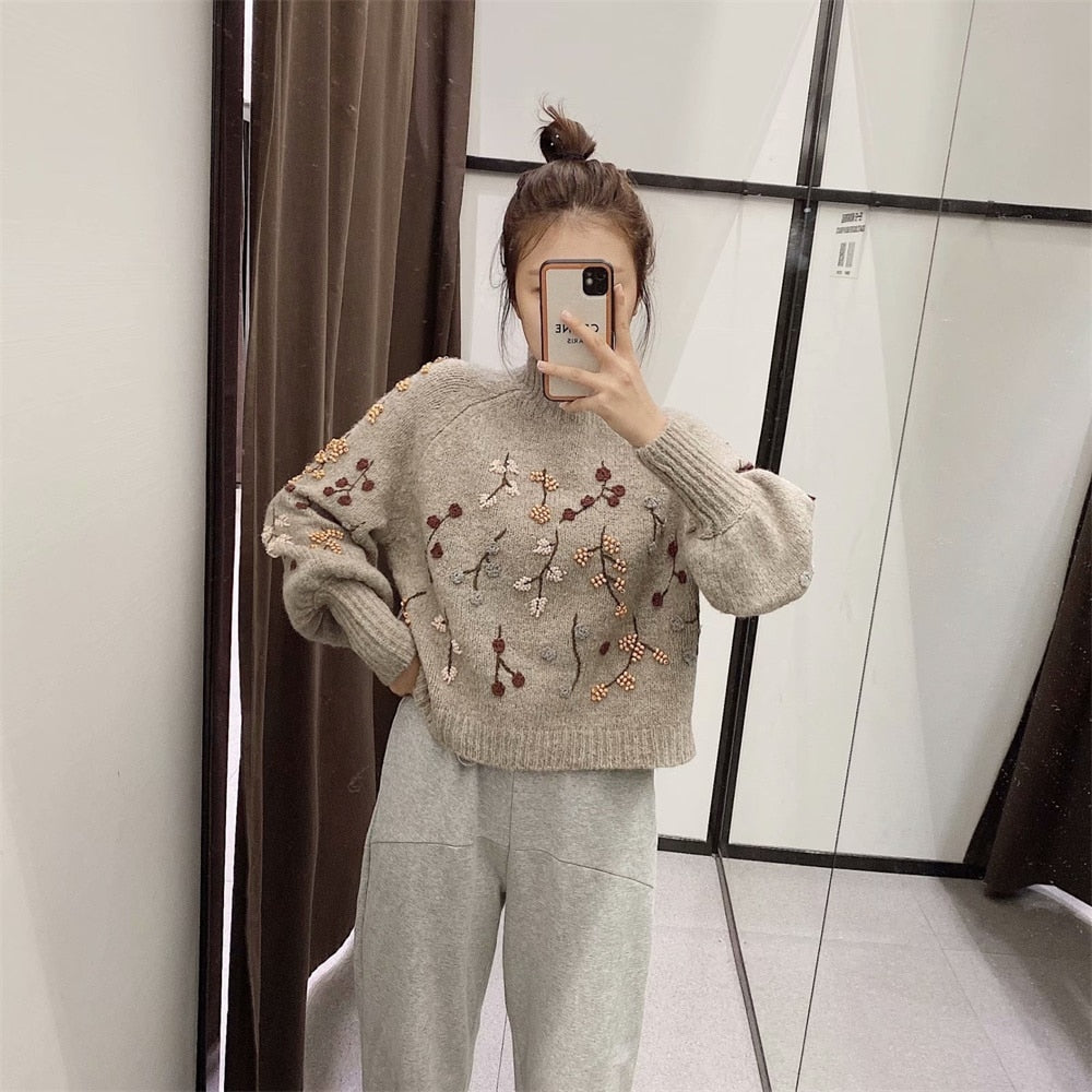 A Vintage Style Sweater with Delicate Timeless Details