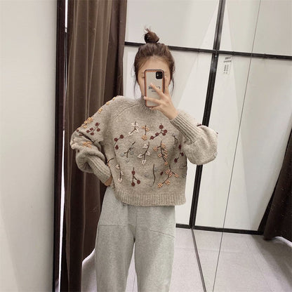 A Vintage Style Sweater with Delicate Timeless Details