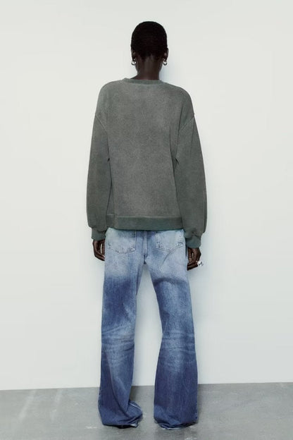 A Vintage Style Sweater with Delicate Timeless Details