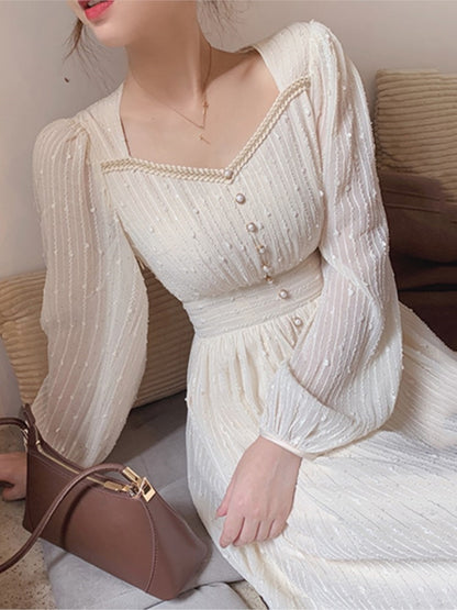 A Vintage Style Dress with Delicate Timeless Details