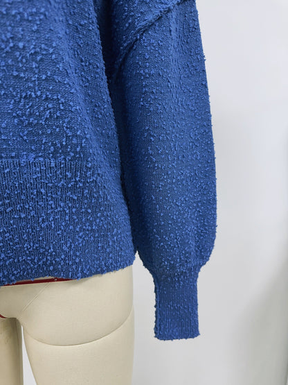 A Vintage Style Cardigan with Delicate Timeless Details