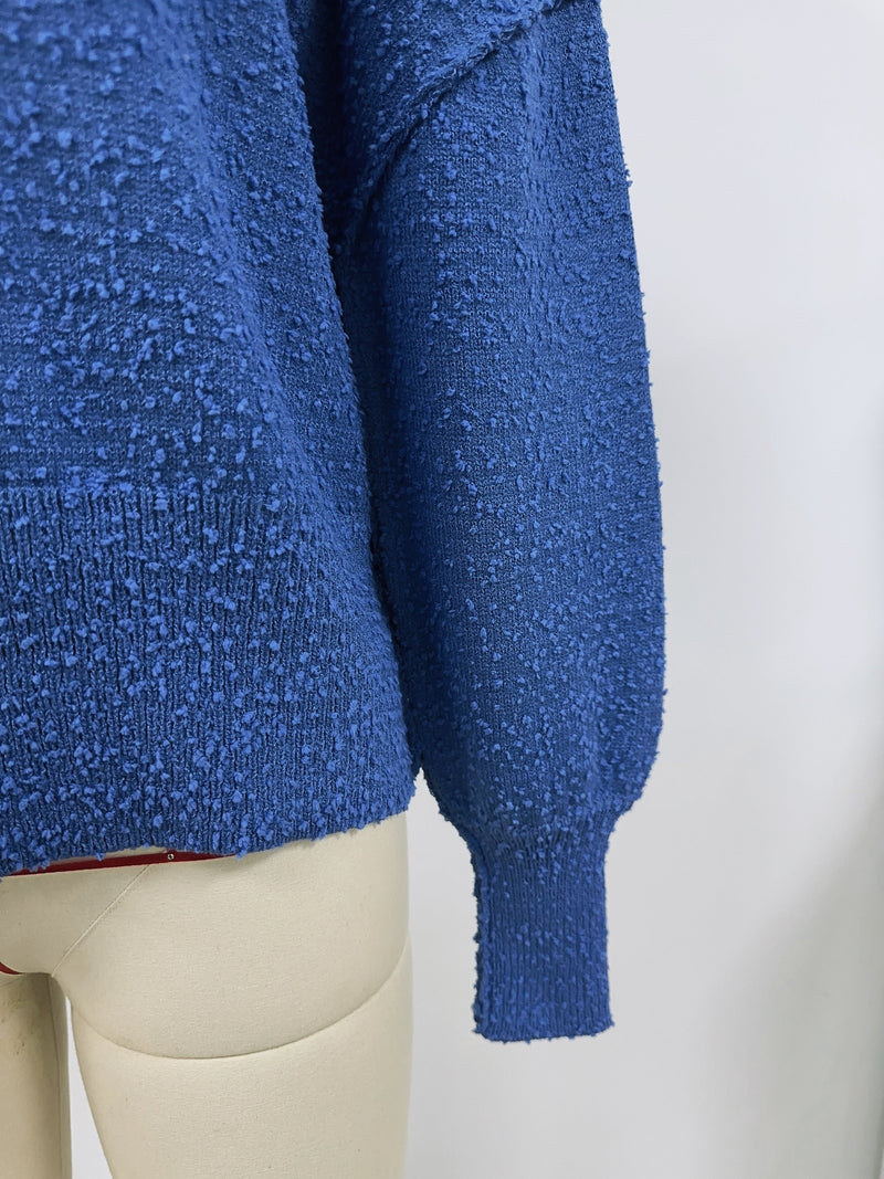 A Vintage Style Cardigan with Delicate Timeless Details