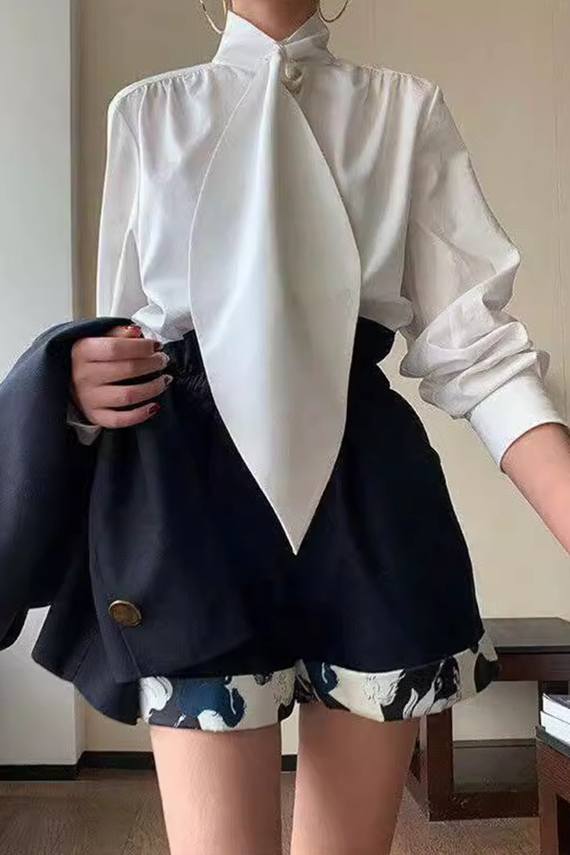A Vintage Style Blouse with Delicate Timeless Details